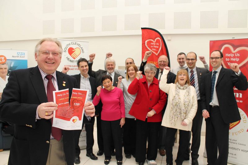 Adrian Davies, chairman of South Cleveland Heart Fund, celebrates with staff and volunteers after reaching the £1m target for upgrading the MRI scanner at The James Cook University Hospital