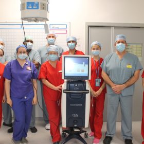 Consultant plastic surgeon Tobian Muir and the team with the IGEA Cliniporator machine