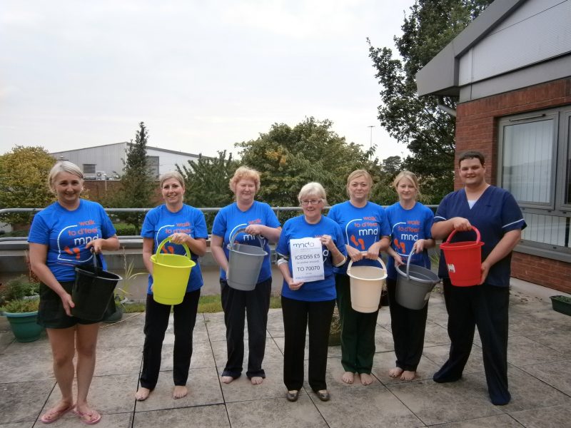 Fundraising team with buckets 