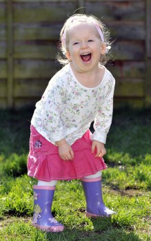 Megan laughing in the garden