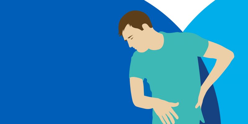 Graphic showing a person holding their back looking as if they are in pain