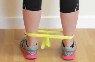 Resistance band placed around the ankles