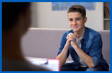 Young person discussing their care with a medical professional