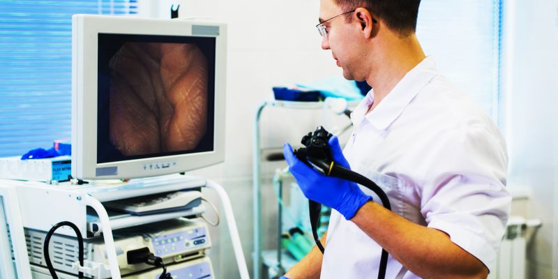 Image of a endoscopist performing a colonoscopy