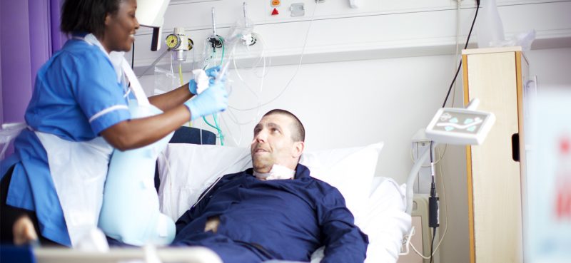 Patient being cared for in a hospital setting