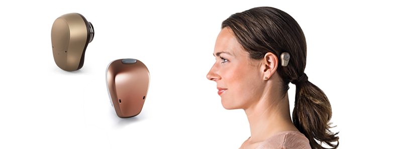 Image of a lady wearing a hearing device 