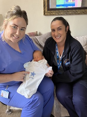 Catherine Moore and Nazihah Younis with baby Anthony