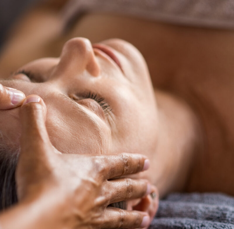 patient undergoing a relaxing head massage