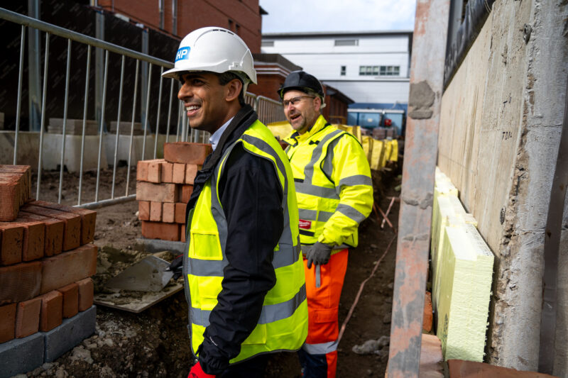 MP Rishi Sunak lays one of the first bricks