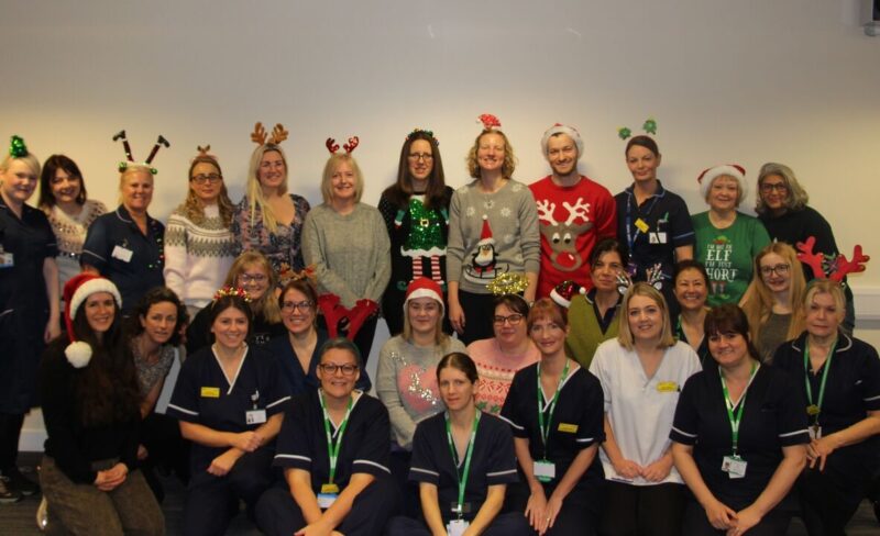 Team photo in Christmas decorations