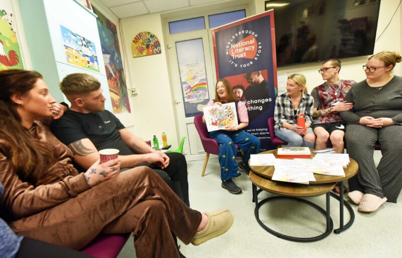 Author Hannah Graham reading the book in the neonatal unit