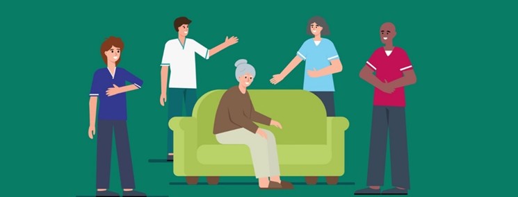 Image showing care practitioners around an older lady sitting on a sofa.