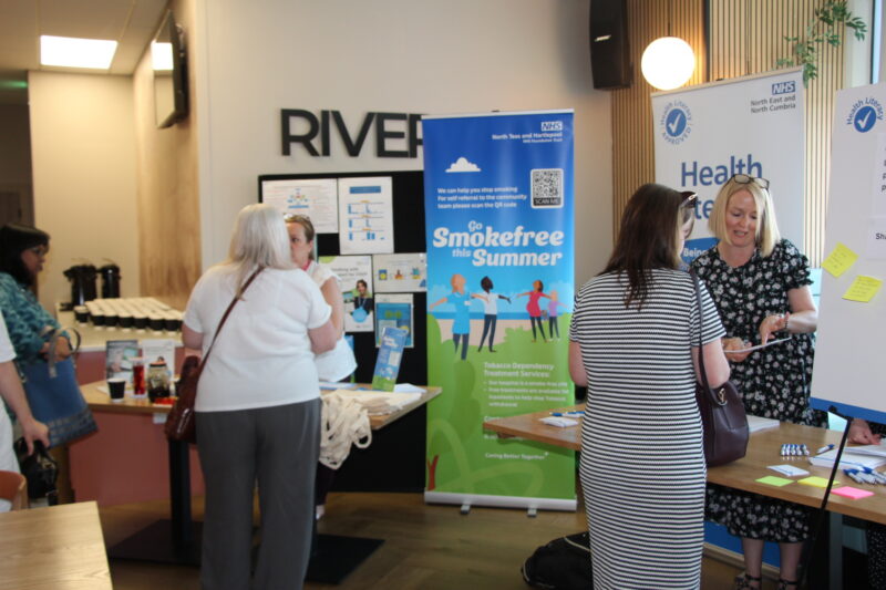 people attending the stalls at the health inequalities conference