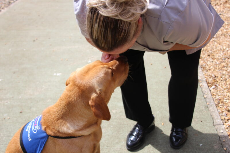 Stacey, a staff member, with Kyro