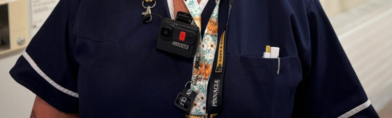The unnamed staff member who now wears a camera
