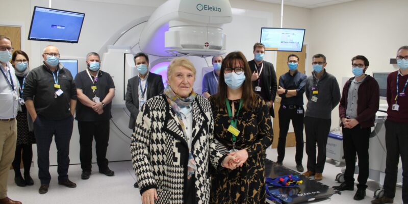 Brenda with the James Cook staff in front of the linear