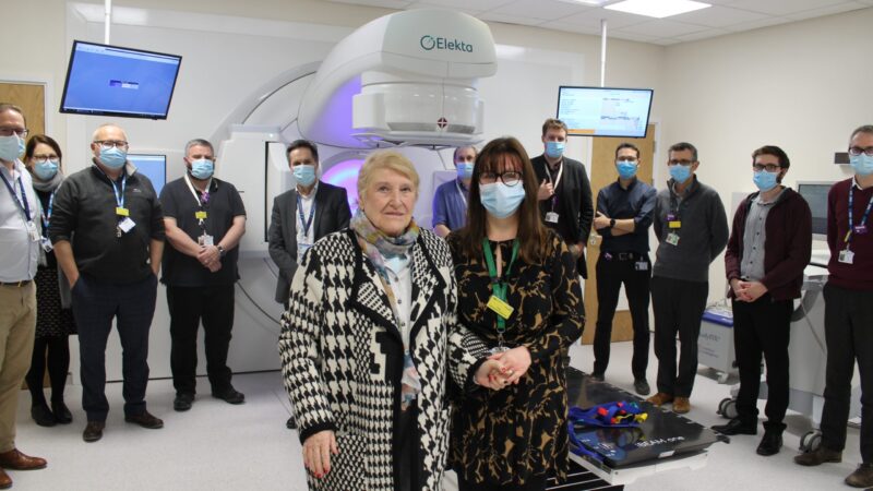 Brenda with the James Cook staff in front of the linear