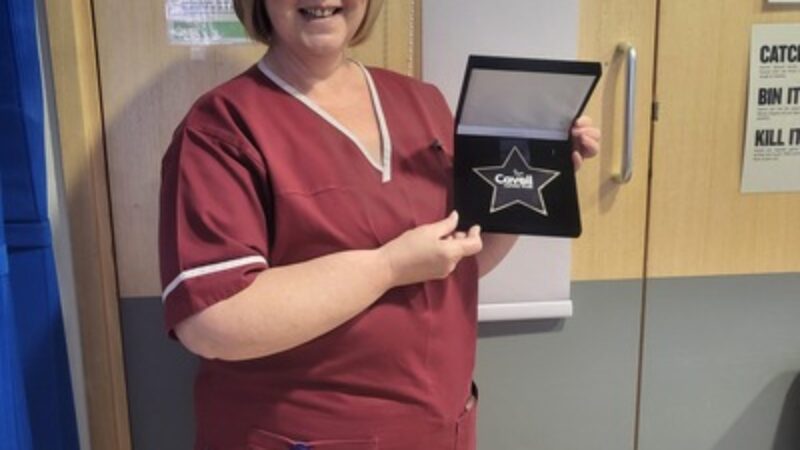 Carol Ann Nassau with the Cavell Star Award