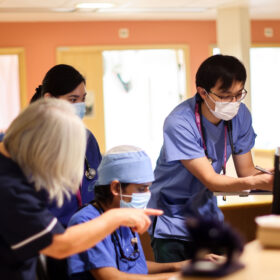 Staff working at nurses station