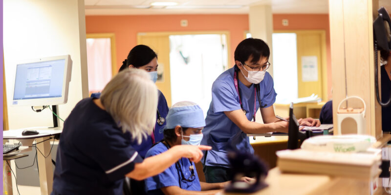 Staff working at nurses station