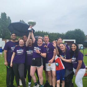 Staff celebrating at the family fun day