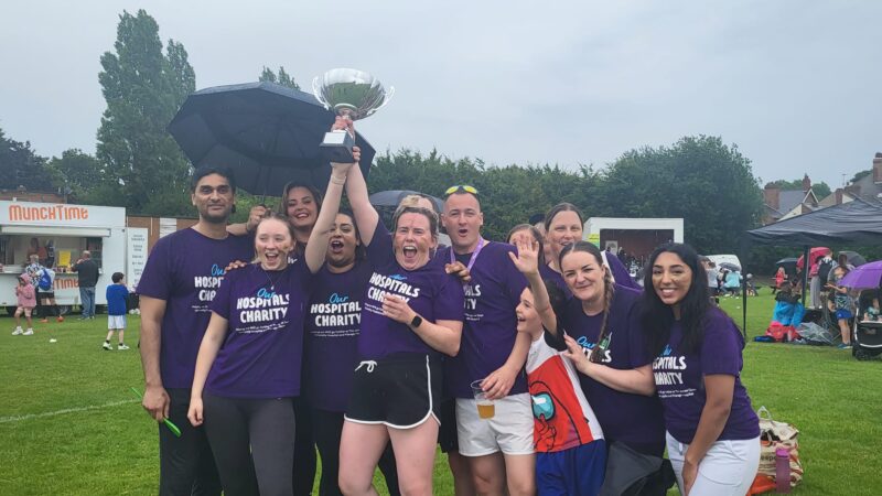 Staff celebrating at the family fun day