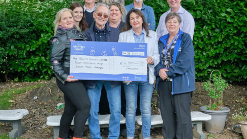 Fabulosa team handing the cheque to the Trinity Holistic Centre