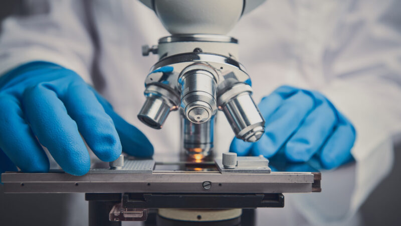 Close-up shot of microscope with metal lens.