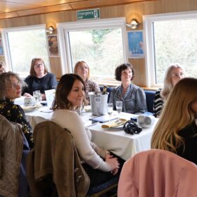 a group of women enjoying a celebration event