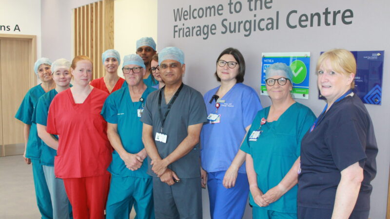 Dr Ashish Gulve and the team celebrating after operating on the 100th patient at the Friarage Hospital