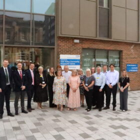 a group of people outside of the diagnostic centre