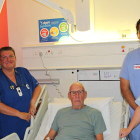 Leslie with the stroke team who saved his eyesight