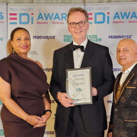 Carol Taylor, Jonathan Ferguson and, Idrees Rashid collecting their award
