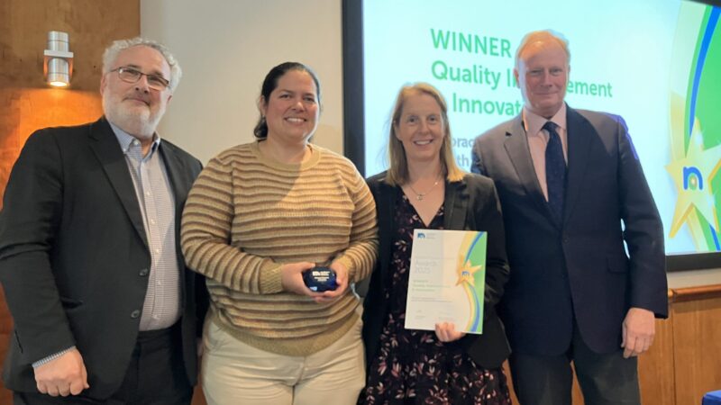 Stacey Stockdale and Rosibel Quintana receiving their award at the Northern Cancer Alliance conference
