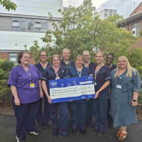 Lung cancer team with their donation to Our Hospitals Charity