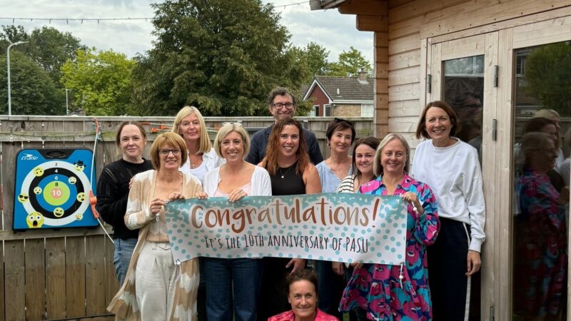 PASU team celebrating 10 years