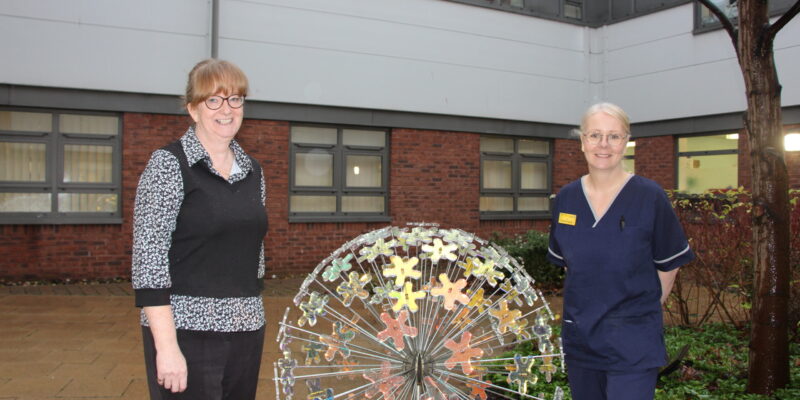 Susan Baldwin and Joanne Ashton in the organ donation garden