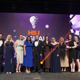 The winning team collect the HSJ award.
