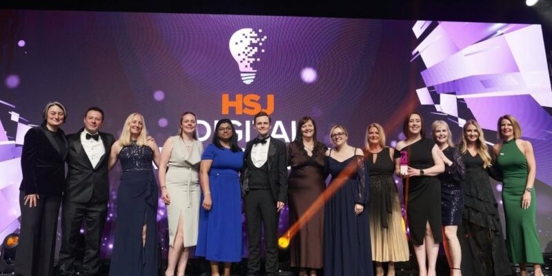 The winning team collect the HSJ award.