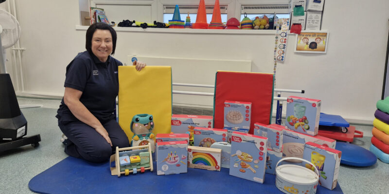 Nicola Hewitson with the toys