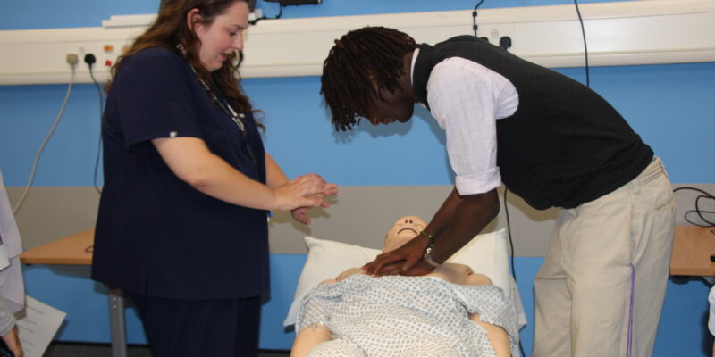 A student takes part in CPR training