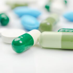 Blue and green pills