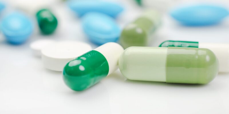 Blue and green pills