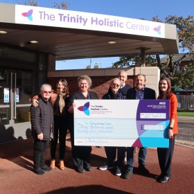 Fabulosa present a cheque to Trinity Holistic Centre
