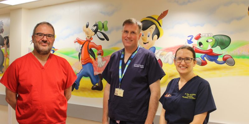 Bruce Jaffray, David Macafee, and Amy Norrington in the children’s theatre corridor at James Cook