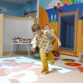 Ezra playing with the new interactive floor projector