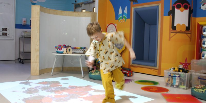 Ezra playing with the new interactive floor projector