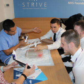 Students learning from an interactive radiology session