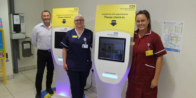 (Left to right) Jay Garrett, digital programme manager, Maxine Stephens ward manager and HCA Lindsey Painter with the self-check-in kiosks
